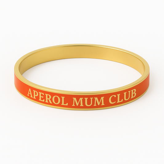 Orange and Gold enamel gold bangle with text 'Aperol Mum Club' on a white background